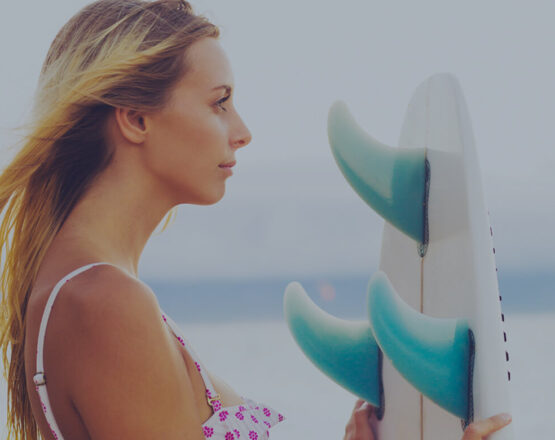 female surfing