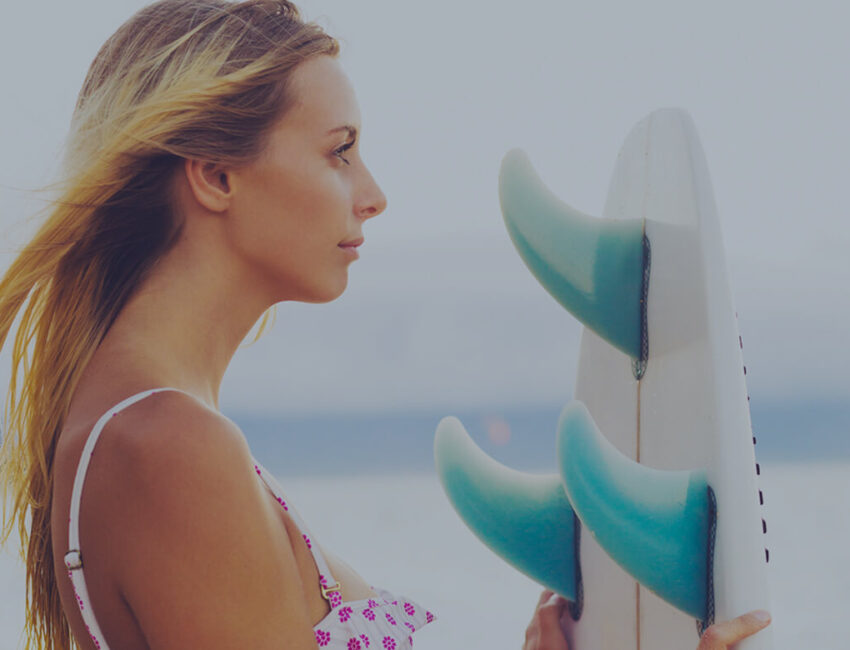 female surfing